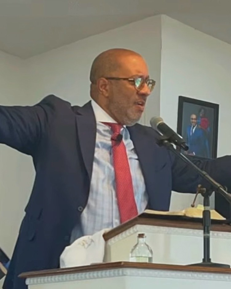 Elder Arvis Miller preaching at United C.O.G.I.C.
